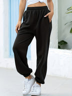 Joggingbroek met hoge taille, rechte pijp en zijzakken
