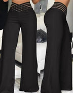 Flared broek met hoge taille en doorschijnende meshvlakken