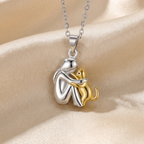 Tweekleurige ketting met kattenhanger