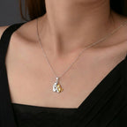 Tweekleurige ketting met kattenhanger