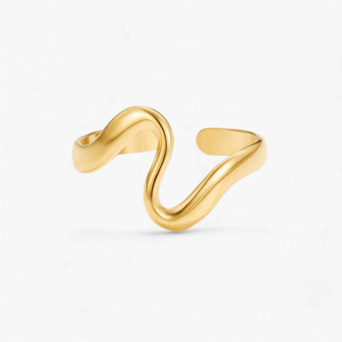 Golvende ring met vergulde afwerking