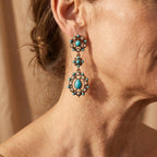 Vergulde bloemenoorbellen met turquoise en parel