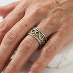 Retro ring met meerdere cirkels in koper- en zilverkleur