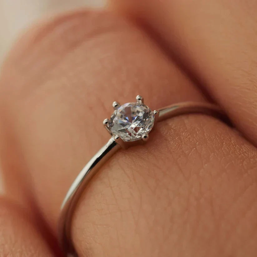 Delicate Solitaire Ring with Thin Band
