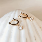 Goudkleurige pavé-oorhangers