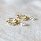 Goudkleurige pavé-oorhangers