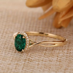 Gedraaide ring met smaragdlook