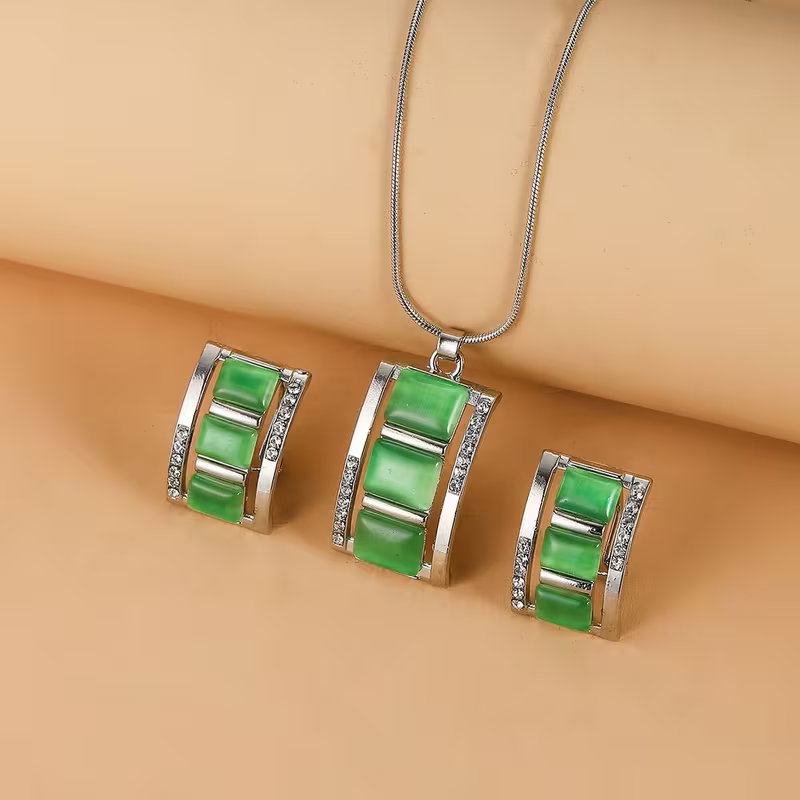 Set van ketting en oorbellen met koraallook