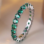 Eternity-bandring met groene kristallen