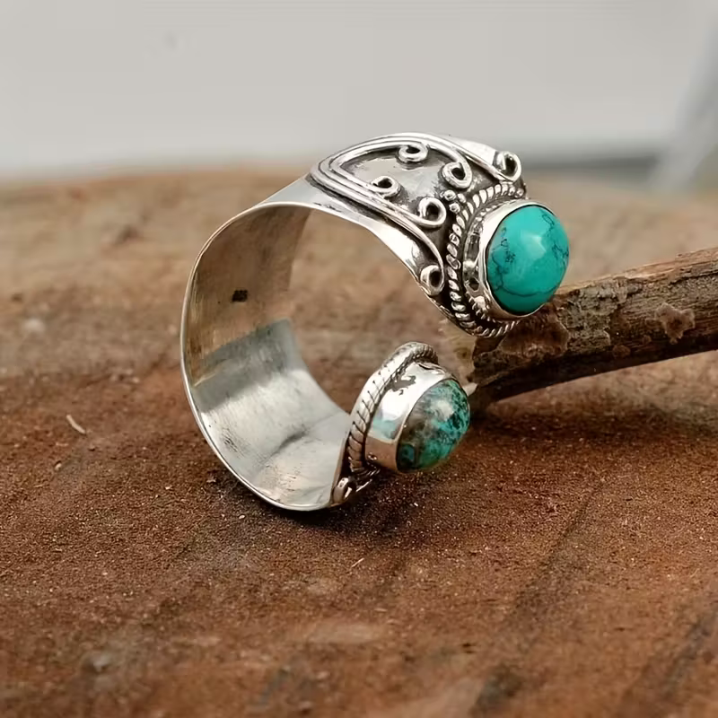 Verstelbare open ring met twee turquoise stenen