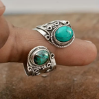 Verstelbare open ring met twee turquoise stenen