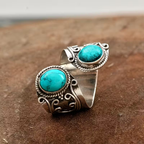 Verstelbare open ring met twee turquoise stenen