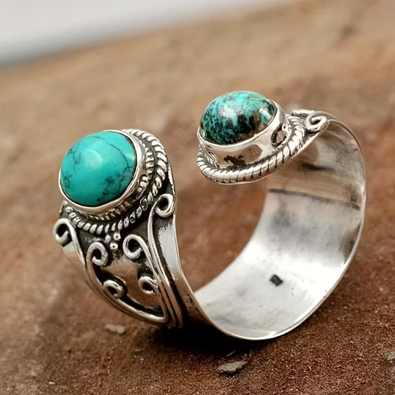 Verstelbare open ring met twee turquoise stenen
