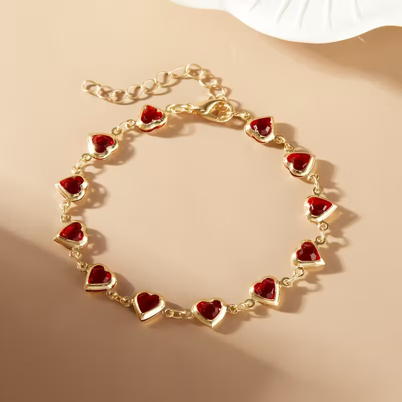 Pulseira de Corrente Dourada com Pedras Vermelhas em Coração