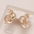 Sculptural Rose Gold-Tone Twist Statement Earrings