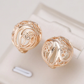 Hollow Sphere Earrings in Gold Tone