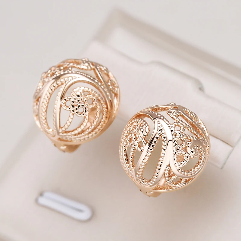 Hollow Sphere Earrings in Gold Tone