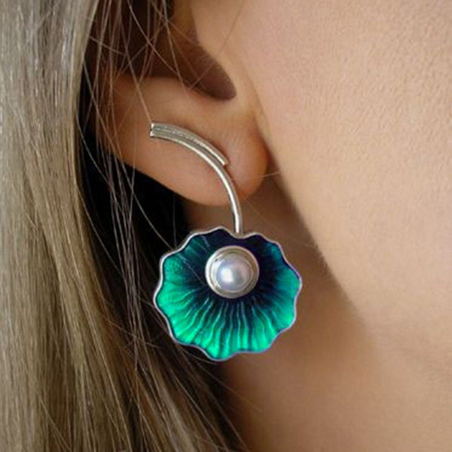 Vintage oorbellen met parel en groene bloesem