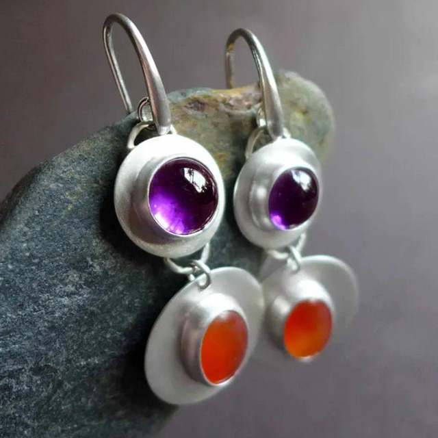 Vintage sterling zilveren oorbellen met rood en paars kristal