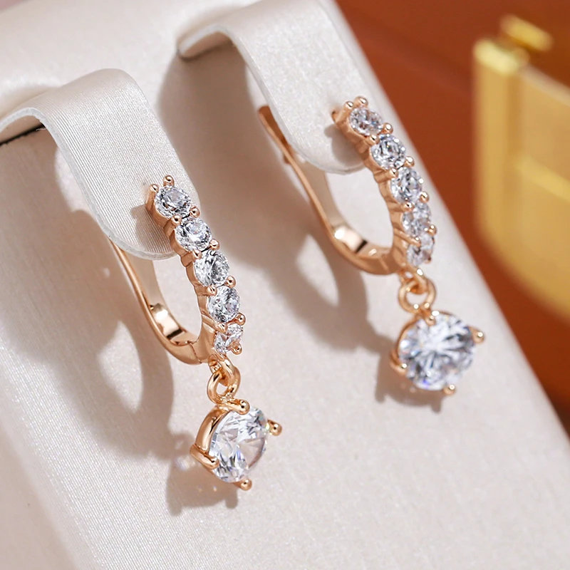 White Zirconia Linear Drop Earrings in Rose Gold Tone