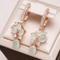 Green Crystal Flower Drop Earrings in Rose Gold Tone