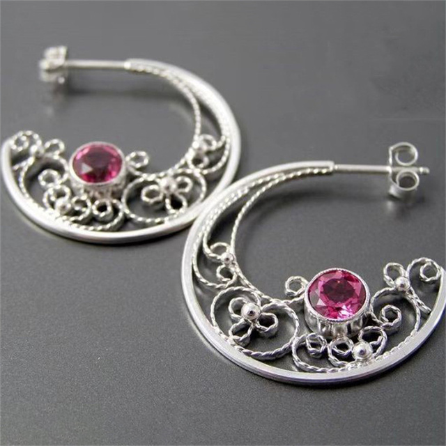 Vintage zilverkleurige maanoorbellen met kristal