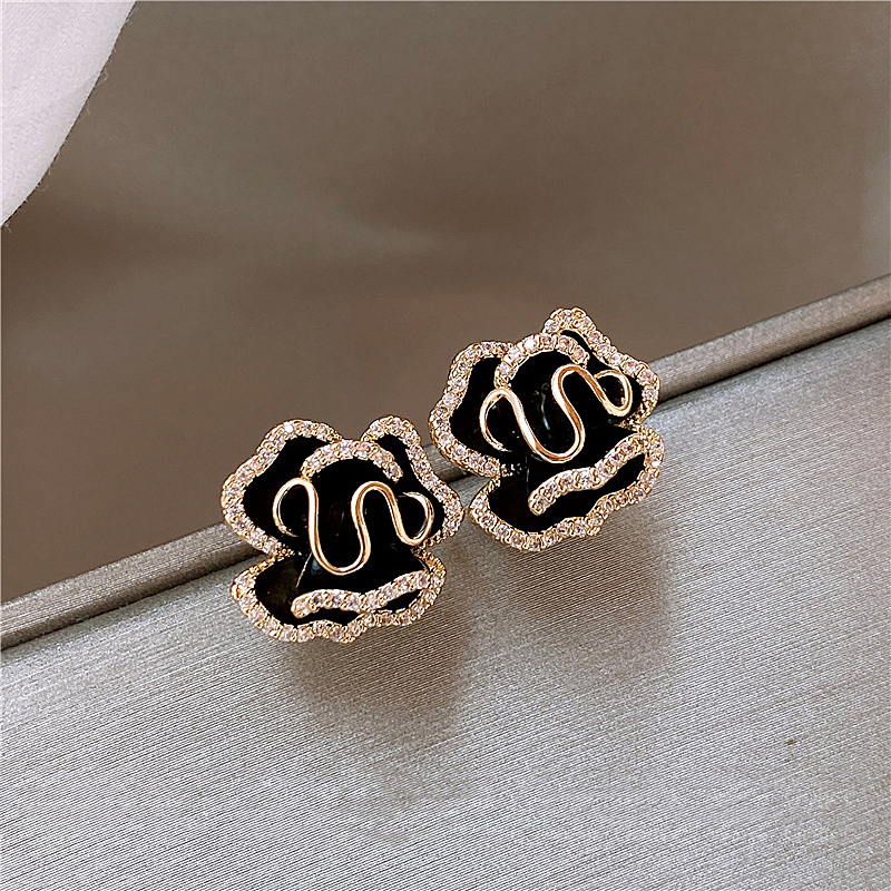 Black Lotus Earrings in Gold Tone