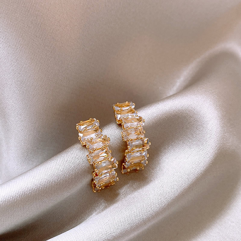 Zirconia Braided Huggie Earrings in Gold Tone