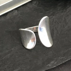 Open zilverkleurige peddelring