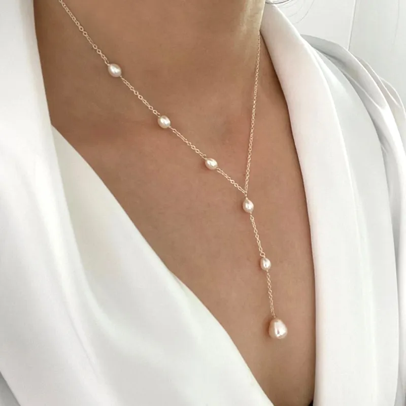 Cascaderende lariat-ketting met parels