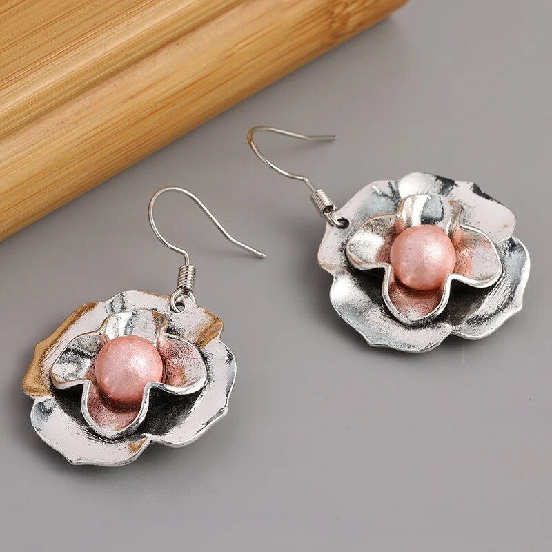 Vintage oorbellen met roze parel