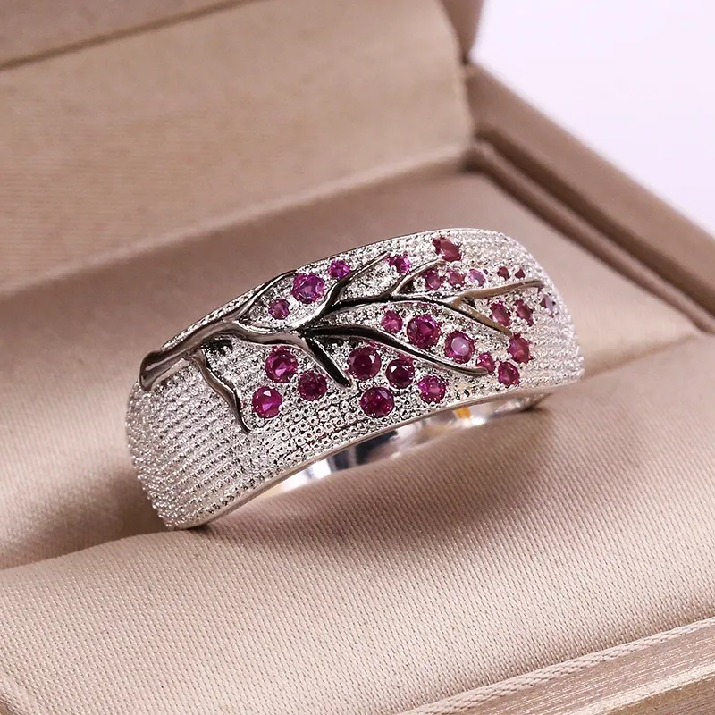 Vintage zilverkleurige ring ingelegd met paarse zirkonia