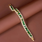 Goudkleurige armband met groene stenen
