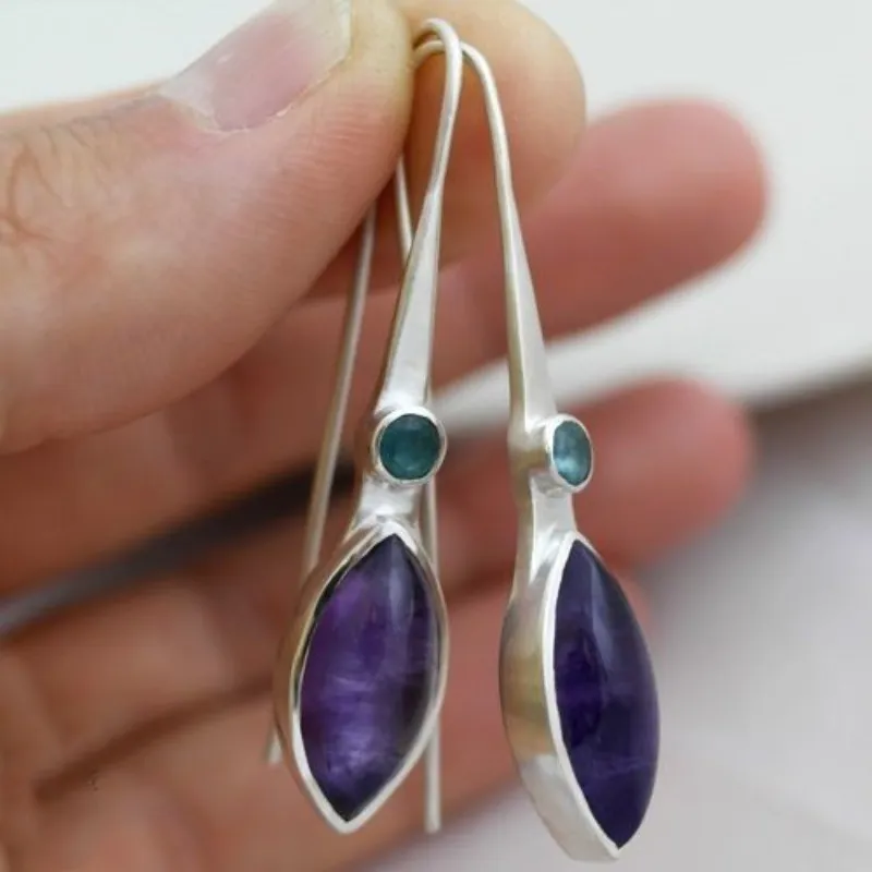 Boucles d'oreilles serties de pierre violette style vintage