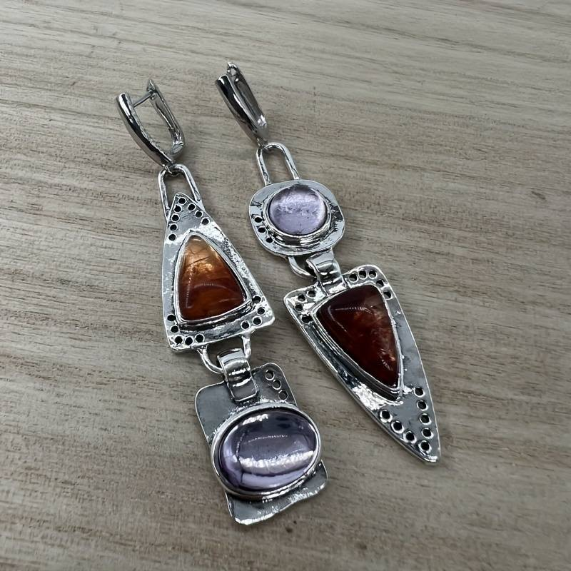 Zilverkleurige oorbellen met kristal in vintagestijl