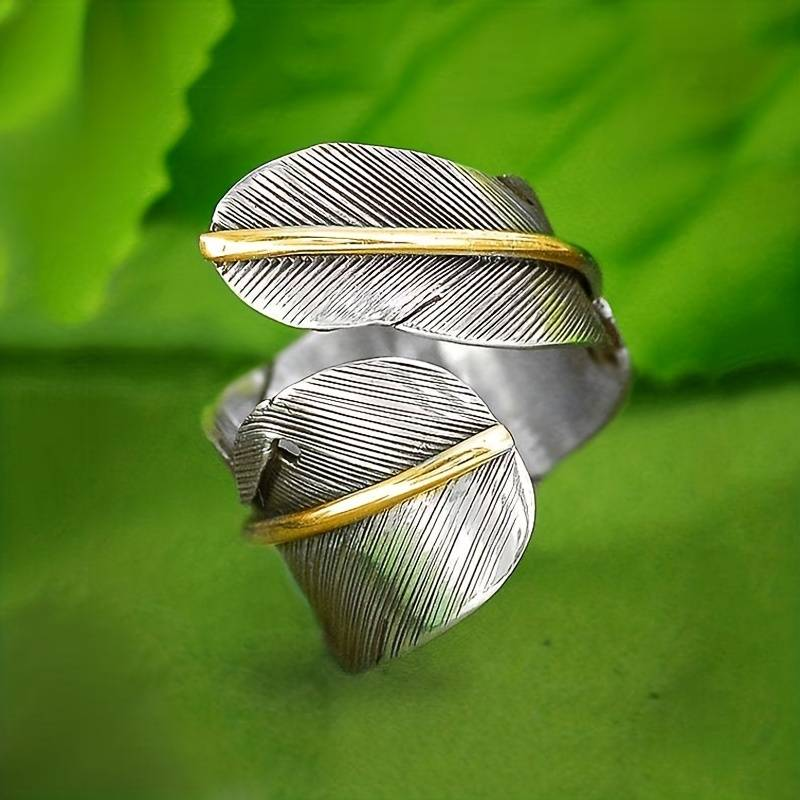 Zilverkleurige spiraalring met blad in vintagestijl