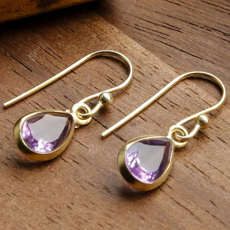 Vintage oorhangers met paars kristal in goudkleur
