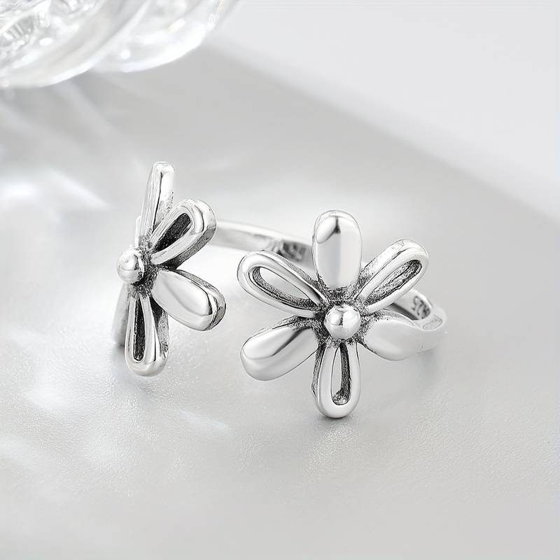 Vintage open zilverkleurige bloemring