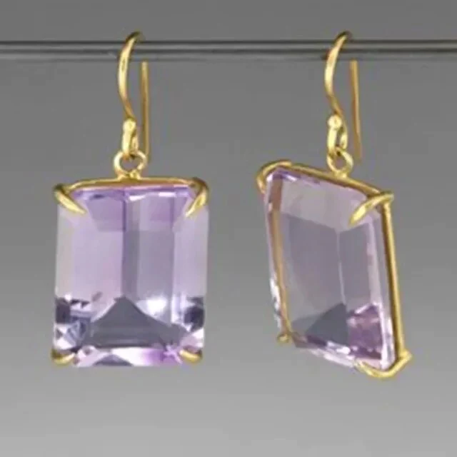 Vintage goudkleurige oorbellen met paarse zirkonia