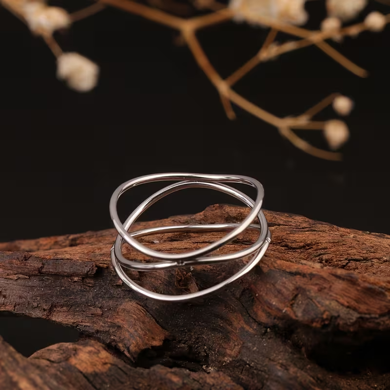 Triple-Layer Intertwined Ring