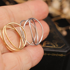 Triple-Layer Intertwined Ring