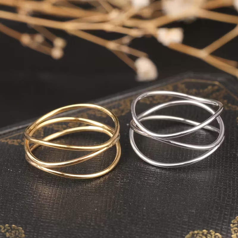 Triple-Layer Intertwined Ring