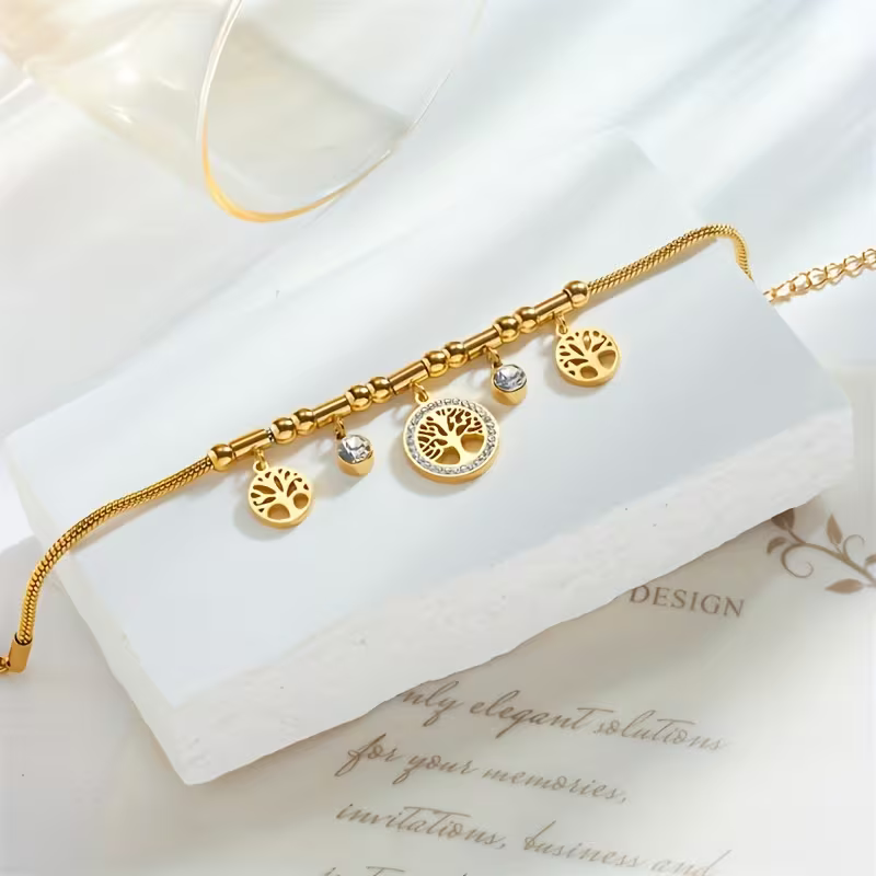 Charm Bracelet with Tree Drop Detail