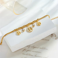 Charm Bracelet with Tree Drop Detail