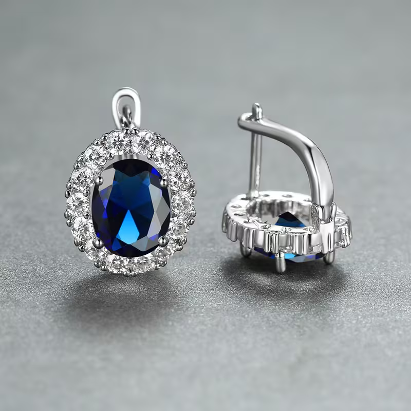 Halo-oorbellen met saffierlook