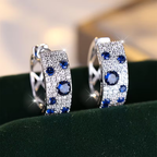 Galaxy-oorringen met blauwe en witte stenen