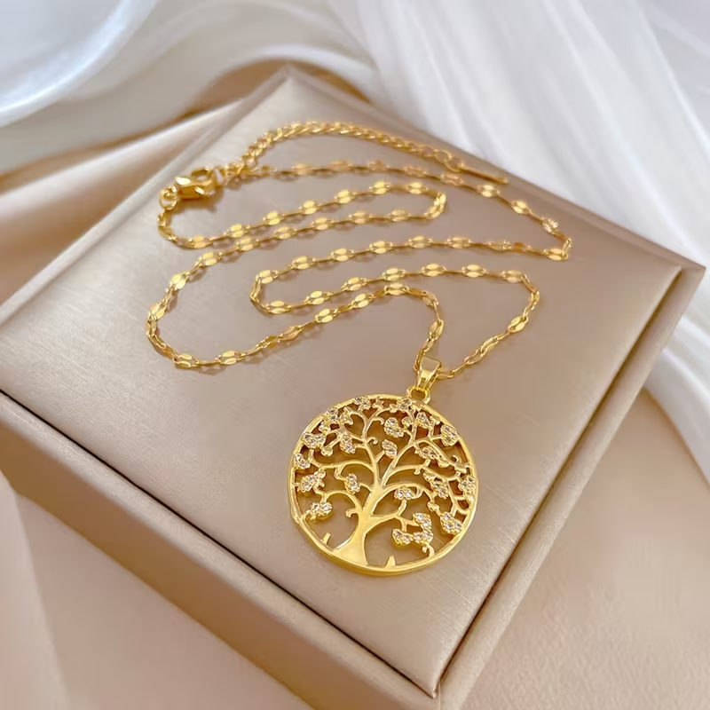 Goudkleurige ketting met schijfhanger met levensboom