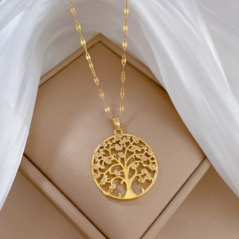 Goudkleurige ketting met schijfhanger met levensboom