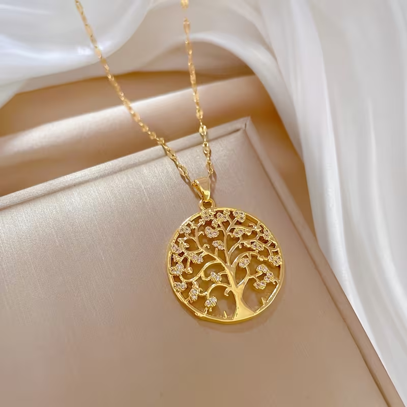 Goudkleurige ketting met schijfhanger met levensboom