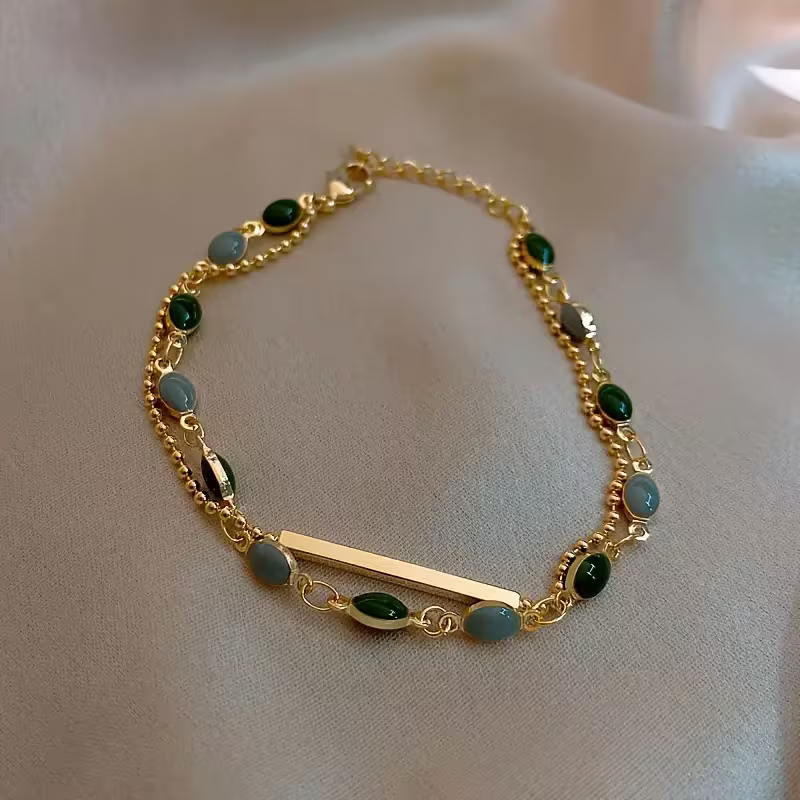 Dubbellaagse armband met groene edelsteen